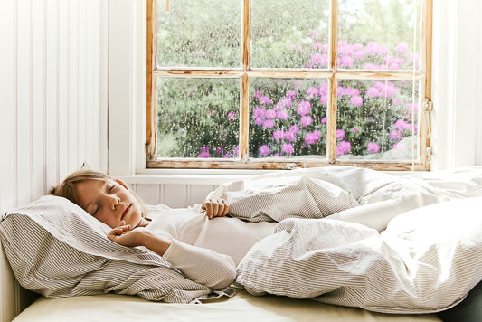 Girl sleeping in natural sleepwear