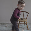 minimalisma Rebel - Baby organic cotton strap pants Leggings / pants for babies Dark Chocolate